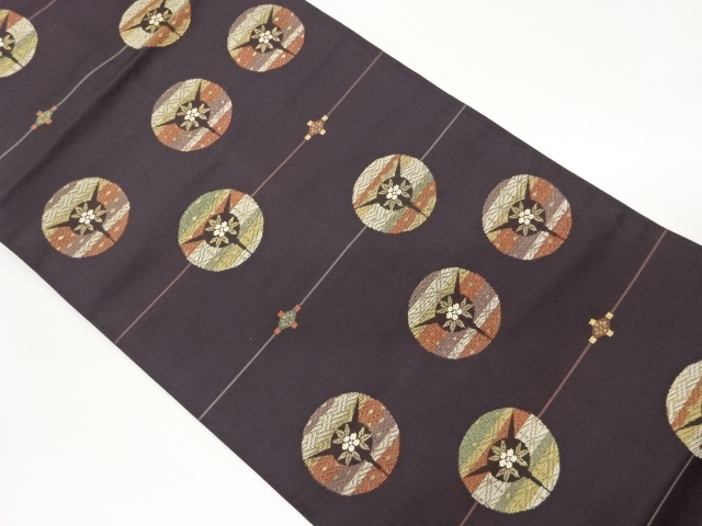 丸文に花葉・菱模様織出し名古屋帯